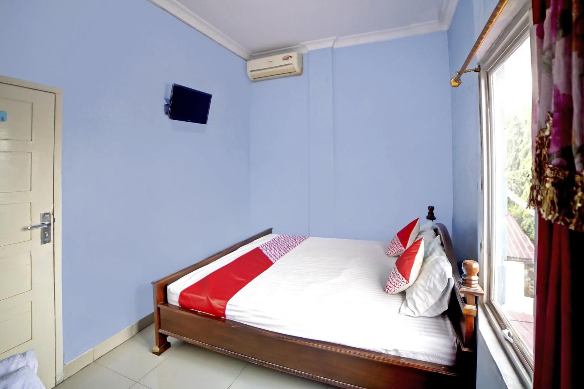 Oyo 90922 Gurusinga Guesthouse Medan Exterior photo
